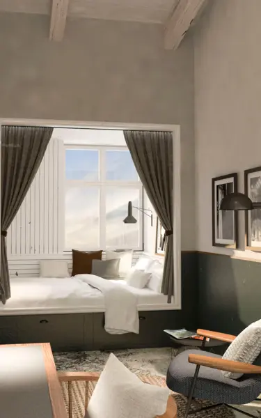 Interno di una stanza con letto, scrivania e sedia.